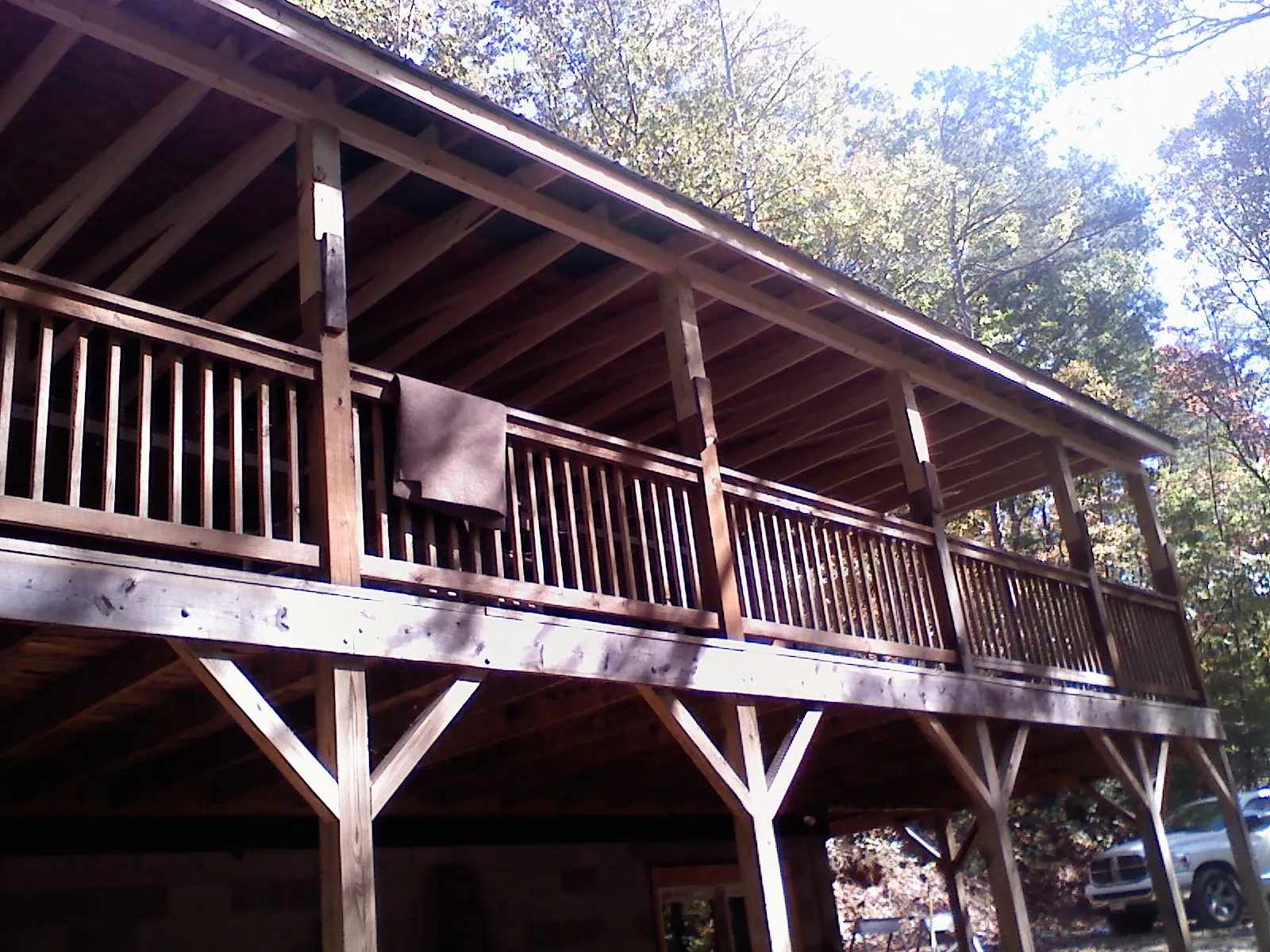 Timber framing under a new elevated porch and deck — Roof Leak Repair in Warm Springs by Roofing Brothers